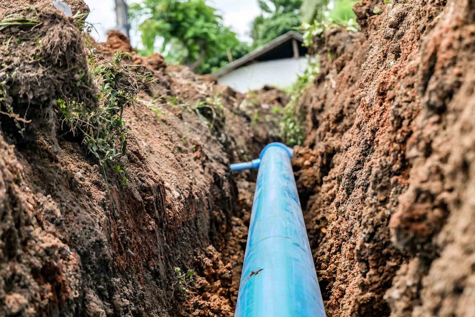 Residential utility services in Albuquerque - technician performing water line repair