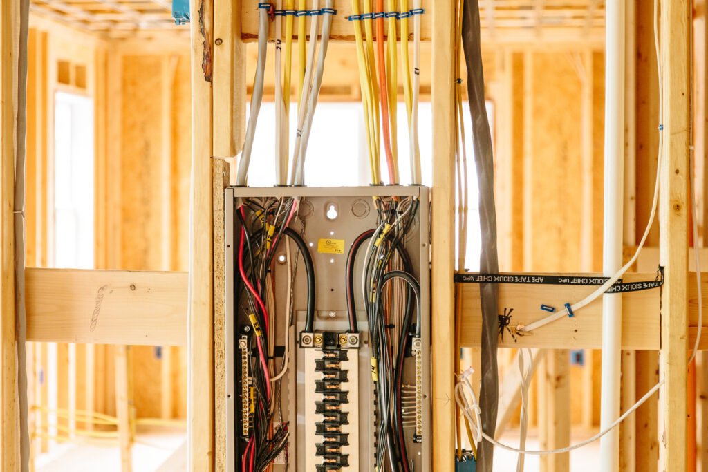 Electrician troubleshooting a residential electrical issue in Albuquerque